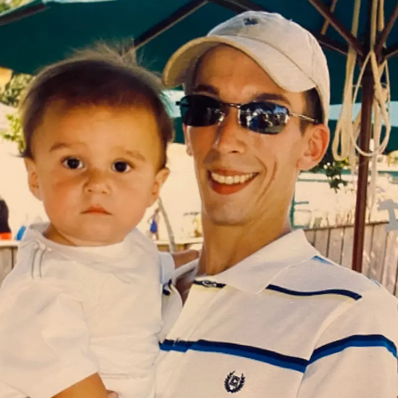 Jason Coulthart with his child